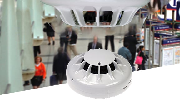 Smoke detector mounted on a wall
