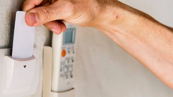 Swiping the card on security door lock