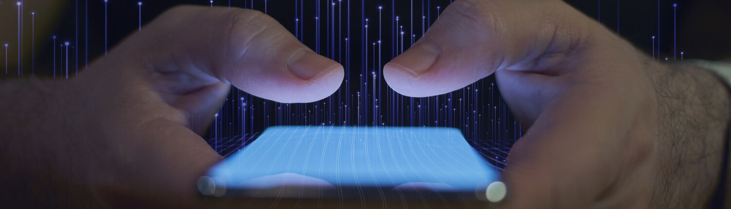 Close-up of a person using a mobile phone, overlaid with OpenBlue graphics